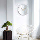 Orologio da parete grande rotondo in metallo specchiato dal design moderno