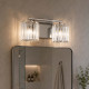 Applique moderna per bagno con struttura in acciaio e doppio diffusore in vetro