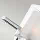 Applique per bagno con struttura in acciaio con tre diffusori in vetro opalino