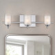 Applique per bagno con struttura in acciaio con tre diffusori in vetro opalino