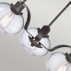 Lampadario moderno in acciaio con 3 diffusori in vetro rotondi
