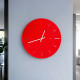 Orologio da parete moderno in plexiglass con lancette in metallo